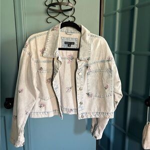 Sincerely Jules floral light wash denim jacket.